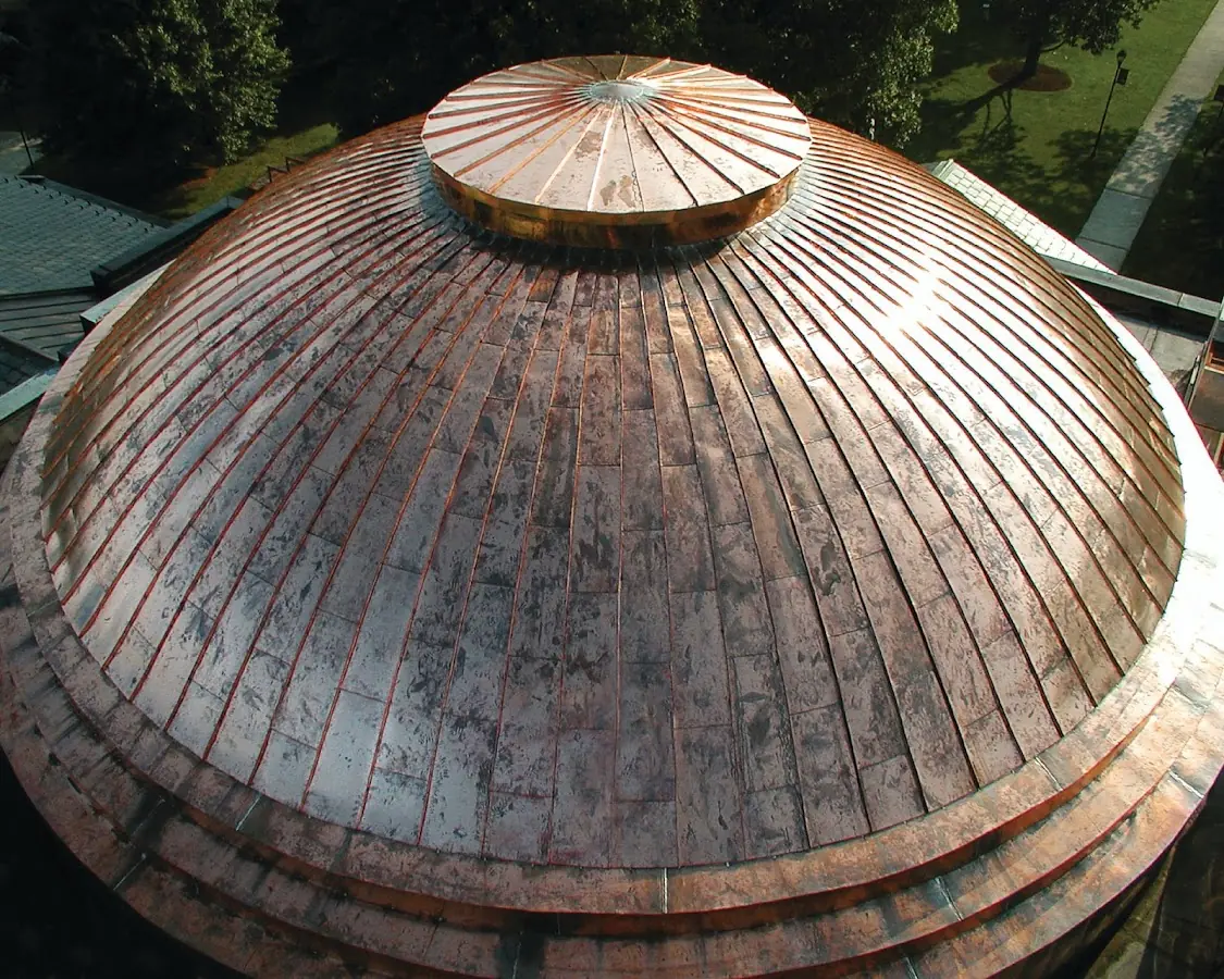 Craftsman Roofing crew installing a new roof in Irish Meeting House